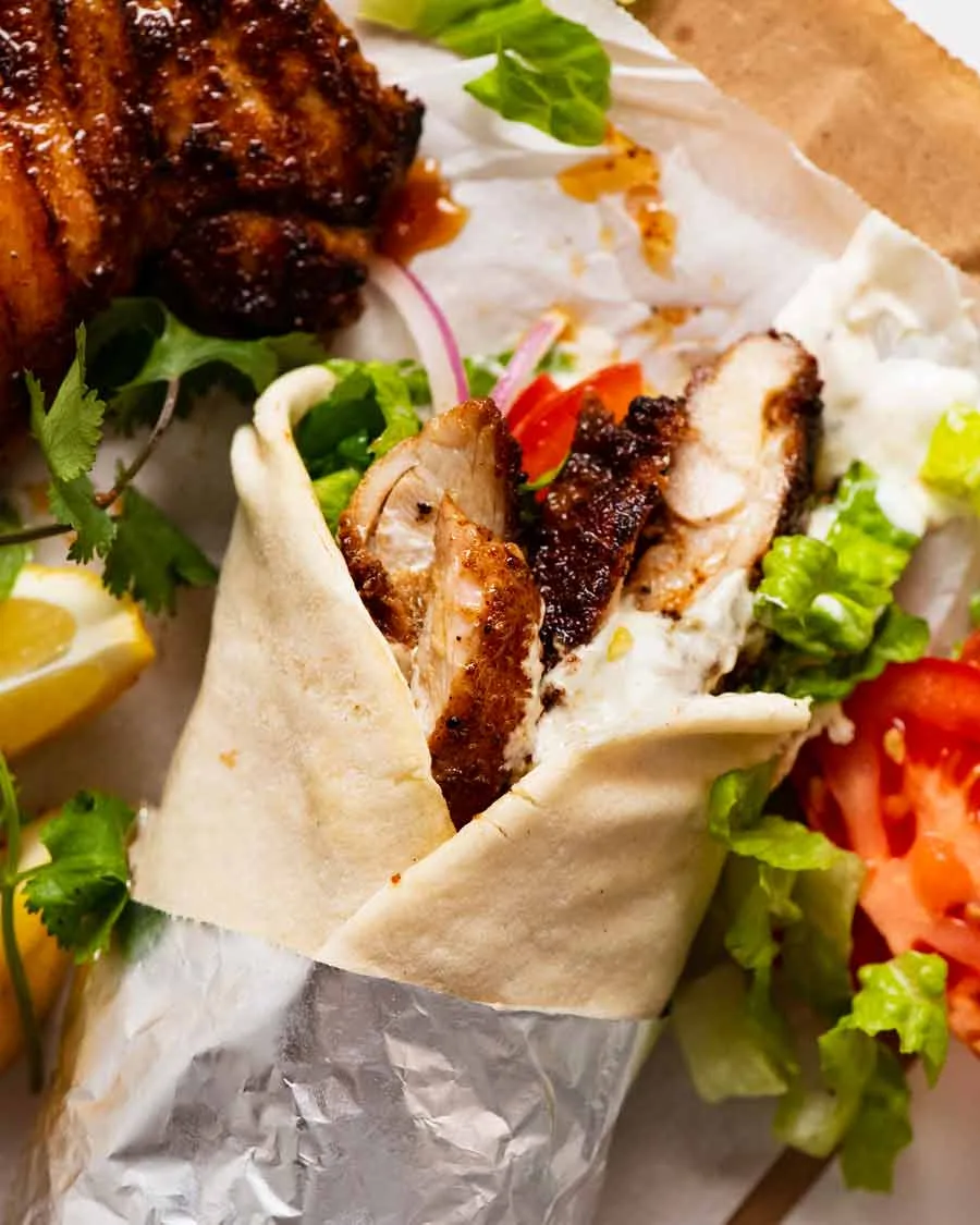 Delicious Lebanese Shawarma: Grill Marinated Chicken or Beef in Pita Bread with Veggies and Tahini Sauce Recipe